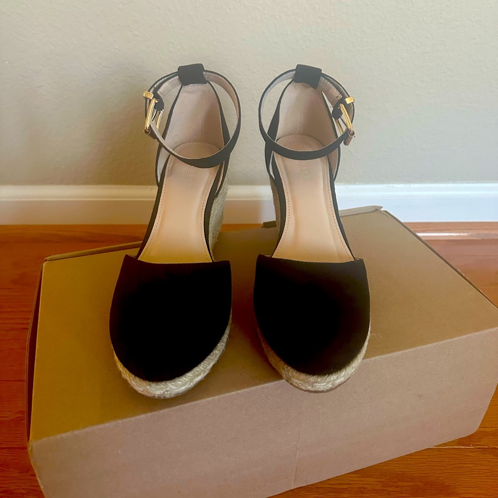 Brand new Truffle Collection espadrille wedges in black.